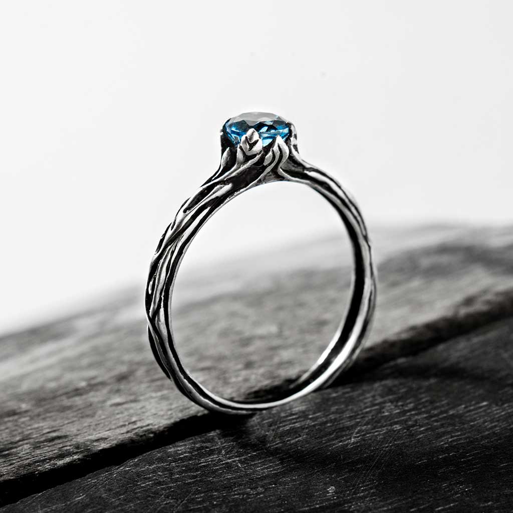 blue topaz sterling silver engagement ring