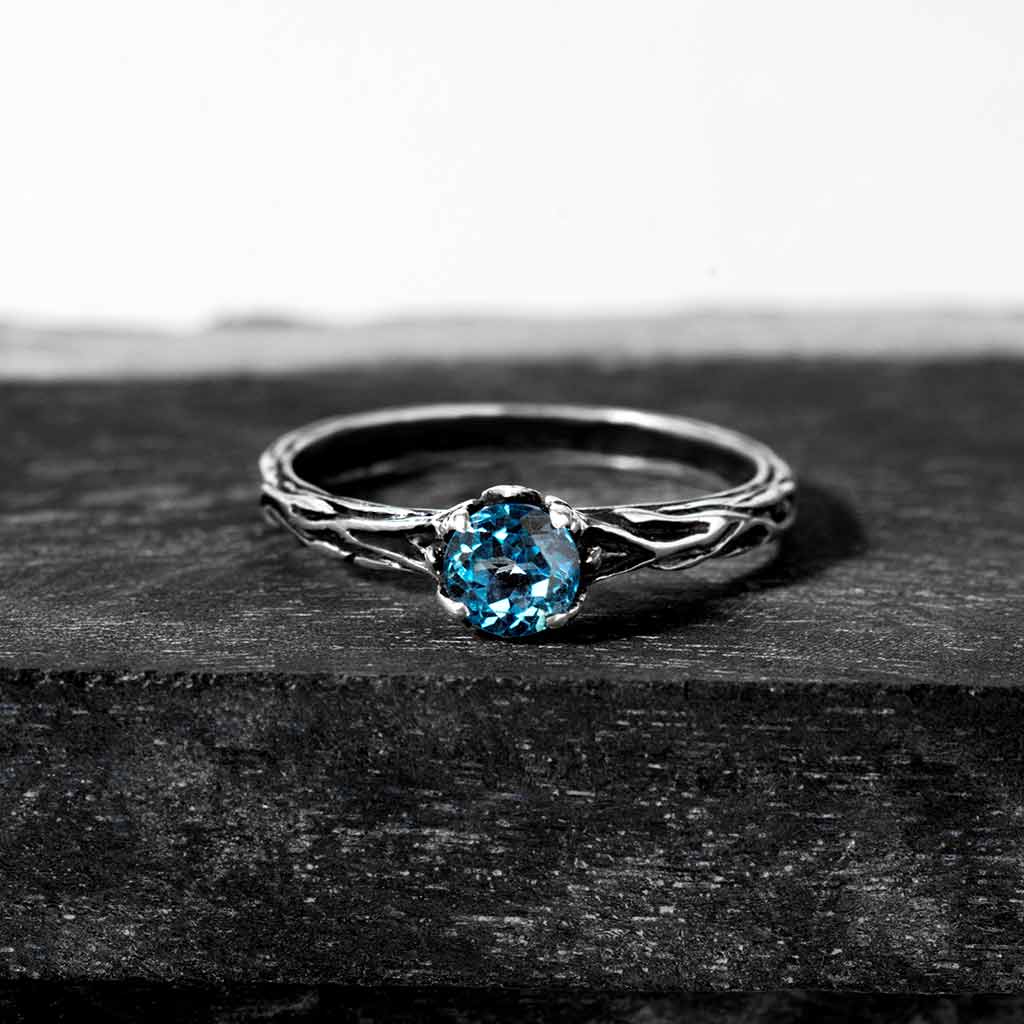 elegant topaz promise ring for her