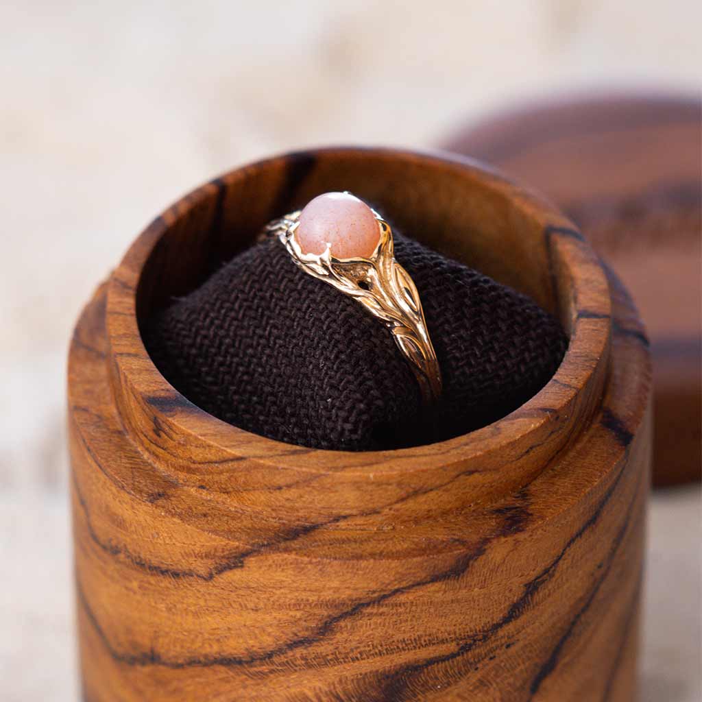 graceful natural peach moonstone simple solid gold ring in wooden box