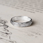 minimalist nature inspired gold wedding band for men