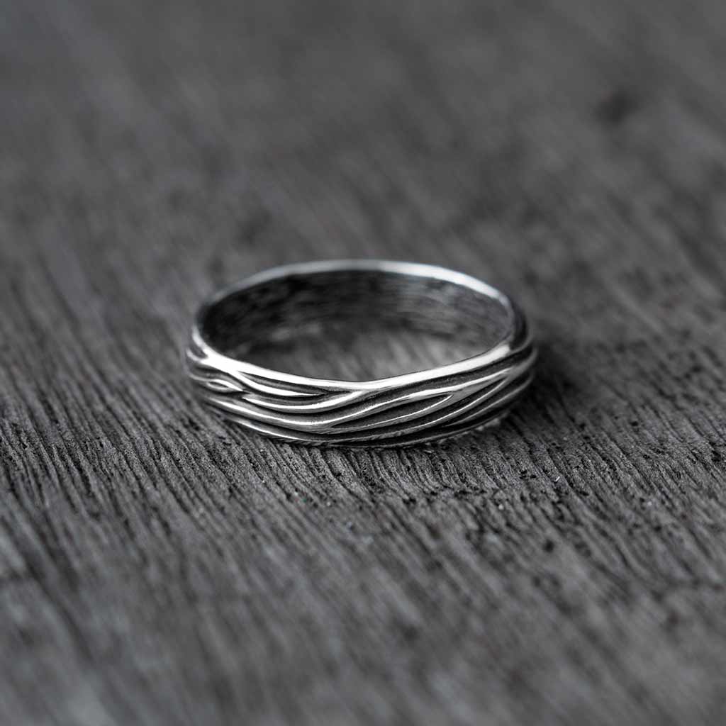 minimalist nature inspired wedding band for him