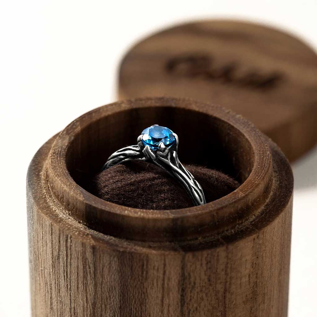 nature inspired twig engagement ring with cobali wooden packaging