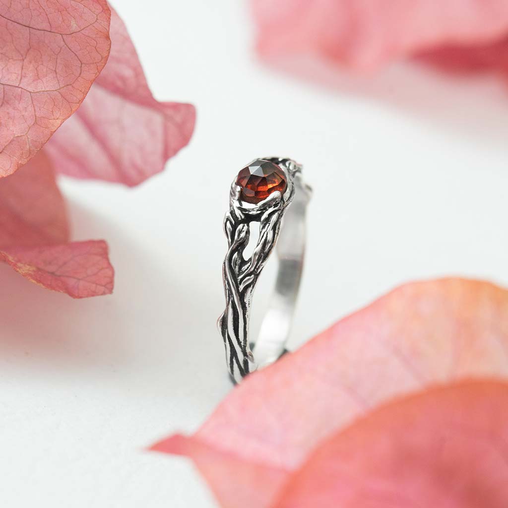sterling silver fashionable garnet friendship ring with leaf branch design